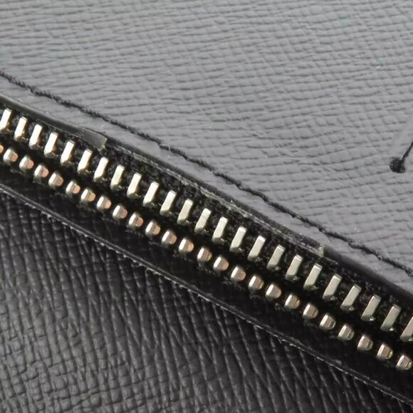 Authenticity guaranteed LOUIS VUITTON Taiga Portefeuille Brazza Long Wallet - Picture 6 of 8